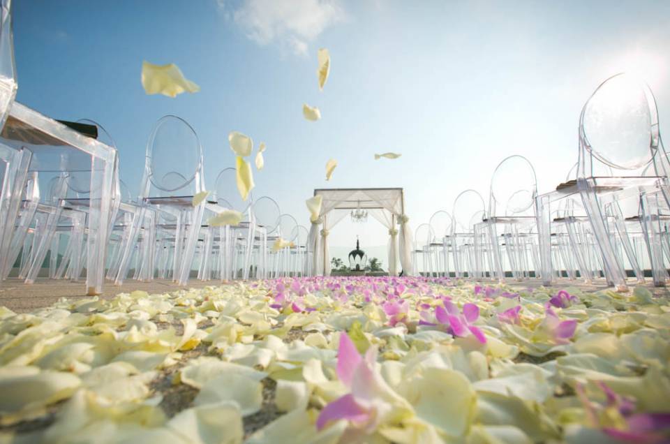 Wedding photography of beautiful Orchid decorated wedding venue in Thailand.