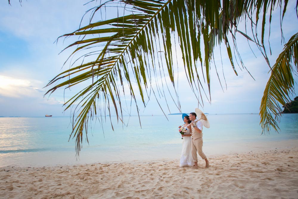 Beach wedding photo shooing for wedding couple in Cape Panwa Phuket Thailand